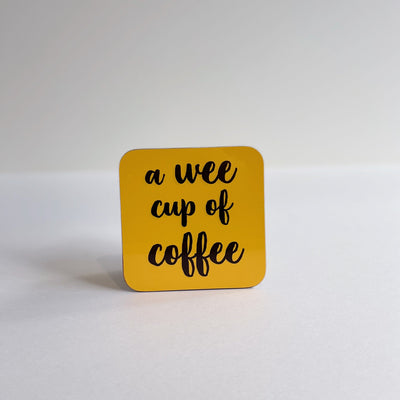 wee cup of coffee coaster yellow